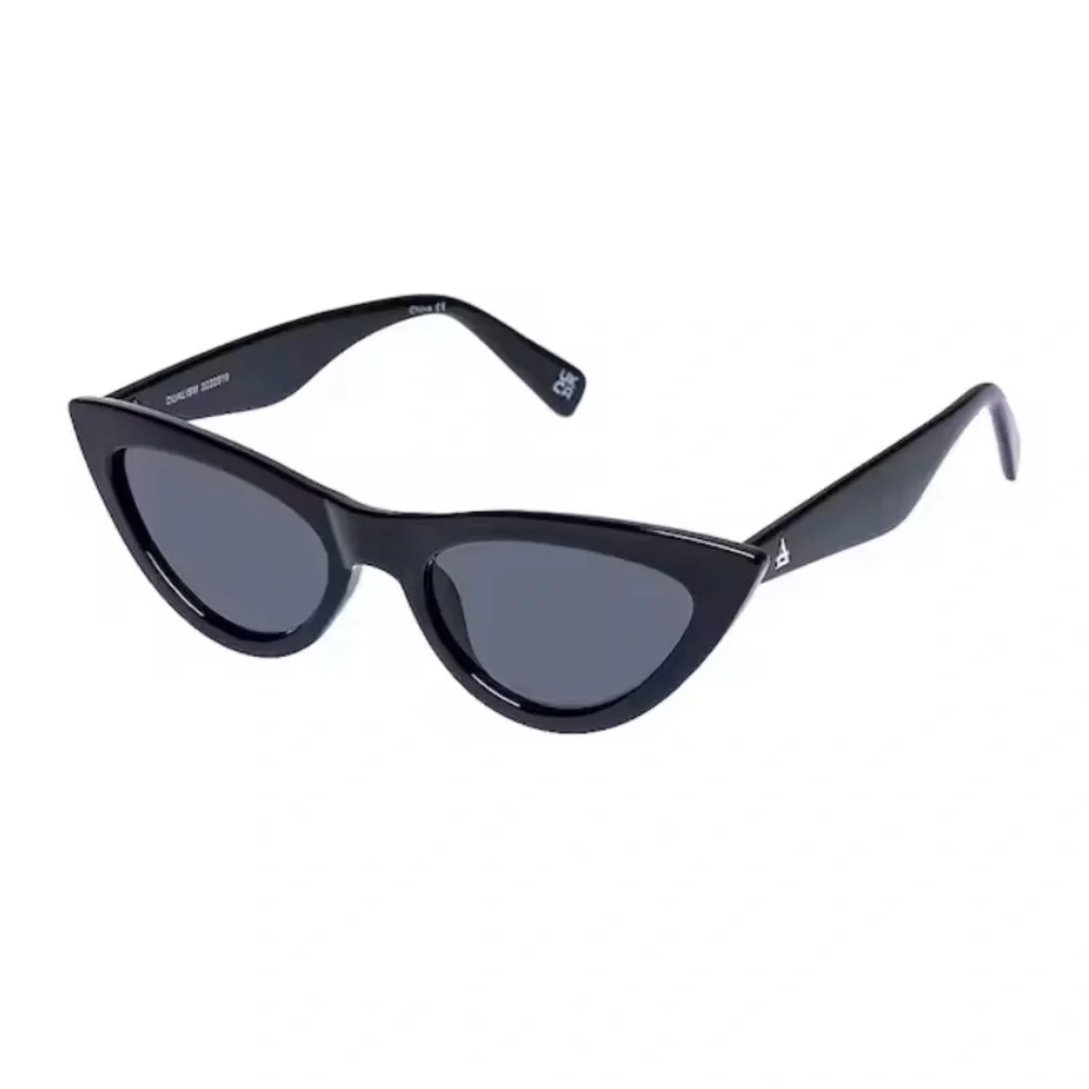 AIRE/Revolve Dualism‎ Cat Eye Sunglasses in Black